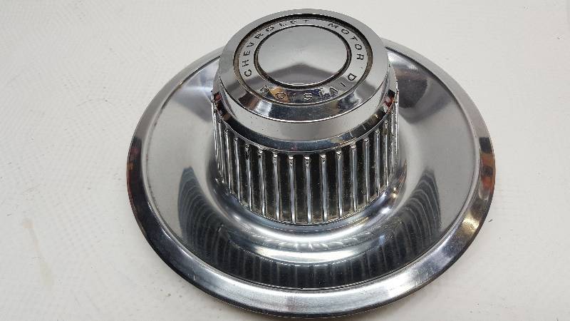 lot 6185 image: Factory Chevrolet Rally wheel Derby center cap in very nice condition.  Might not be concourse but a nice driver cap