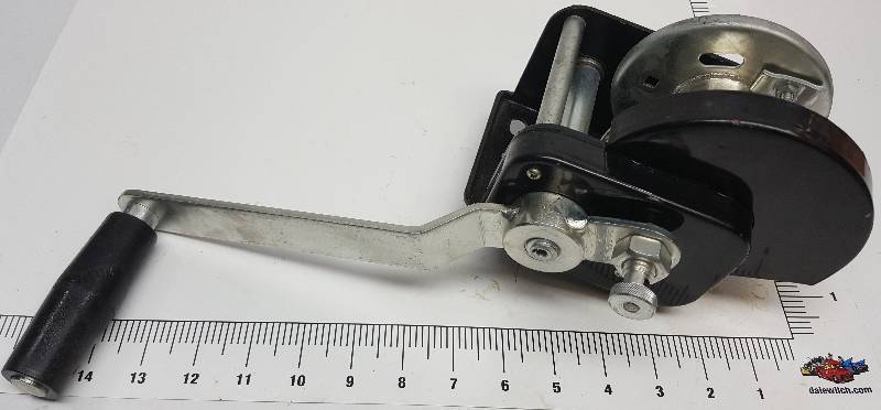 lot 6420 image: Its new and serious heavy duty 5,000# hand operated 4-14 OD spool X 2 inside width cable winch