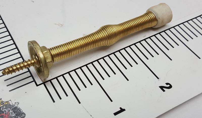 lot 6794 image: New Gold colored spring door stop.  Remember how much fun these were when you kicked them