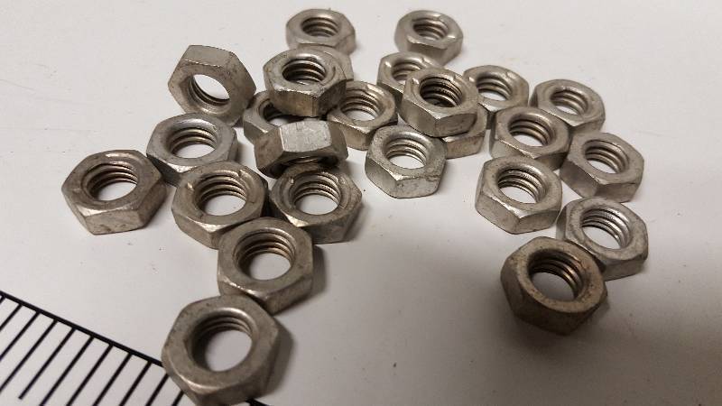 lot 7131 image: 25 new 38 coarse thread jam nuts slightly tarnished but new pieces