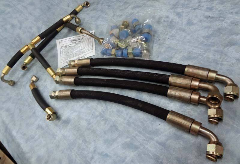 lot 9157 image: Complete service kit of hydraulic hoses and steel high pressure straight & 90 degree fittings.
