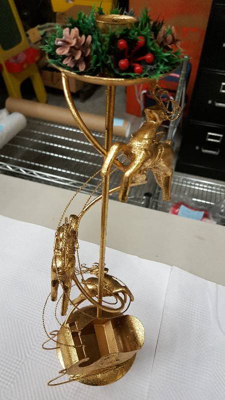 lot 5949 image: Reindeer sleigh candle stick holder. 17 tall  Can use a candle or a glass votive