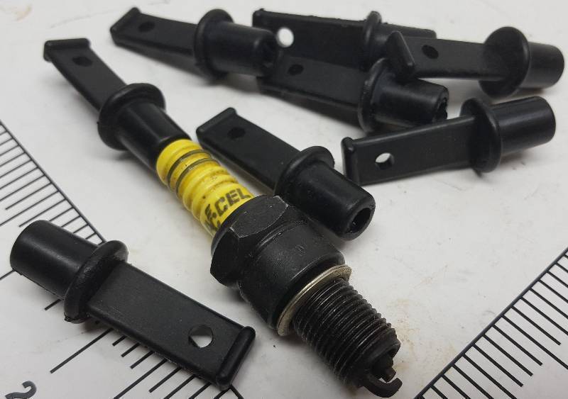 lot 6479 image: New set of 8 individual automotive spark plug installation or storage rubber tools.