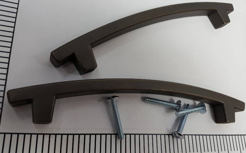 lot 6781-2 image: Pair (2) of new 5 Pierce Drawer Pulls featuring a transitional style that complements a variety of kitchen decor.