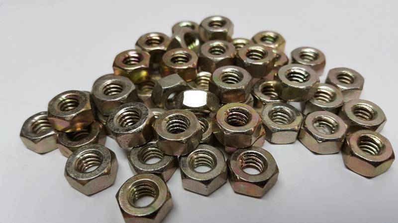 lot 6809 image: Package of 50 new Zinc plated 14 -20 (coarse) thread nuts handy to have in your tool box or on the shelf