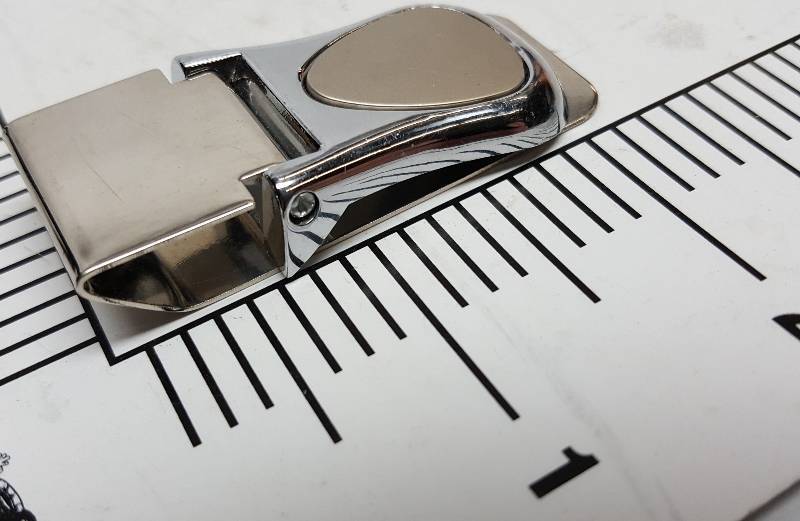 lot 7838 image: Cool plain stainless steel money clip.  I kept the cash and going to sell you the clip.