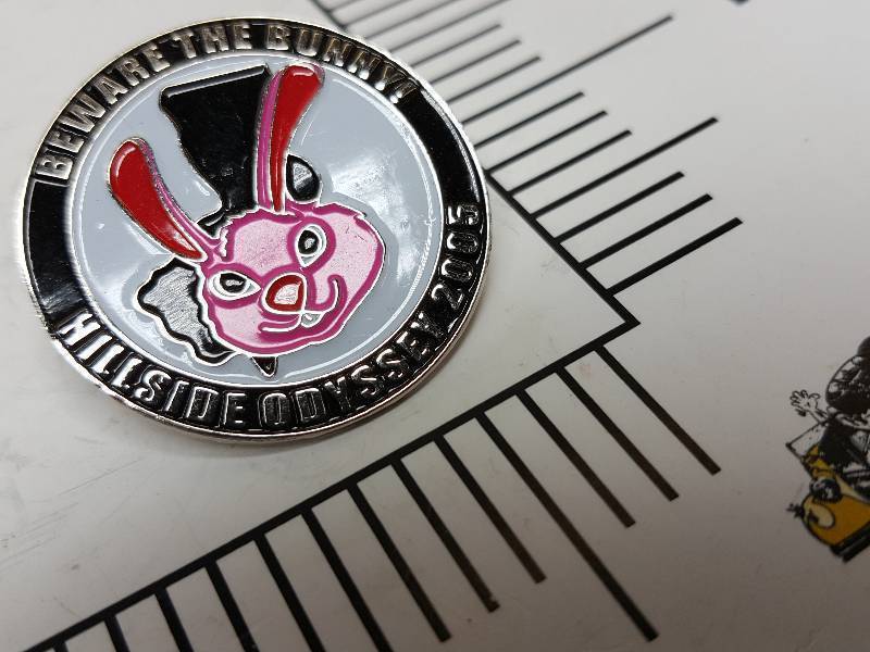 lot 8711 image: Another one of those collectable hat or lapel pins most are finished with wild porcelain colors.