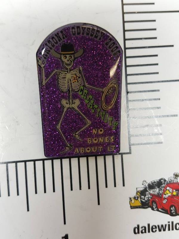 lot 8713 image: Another one of those collectable hat or lapel pins most are finished with wild porcelain colors.