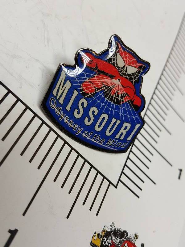 lot 8734 image: Another one of those collectable hat or lapel pins most are finished with wild porcelain colors.