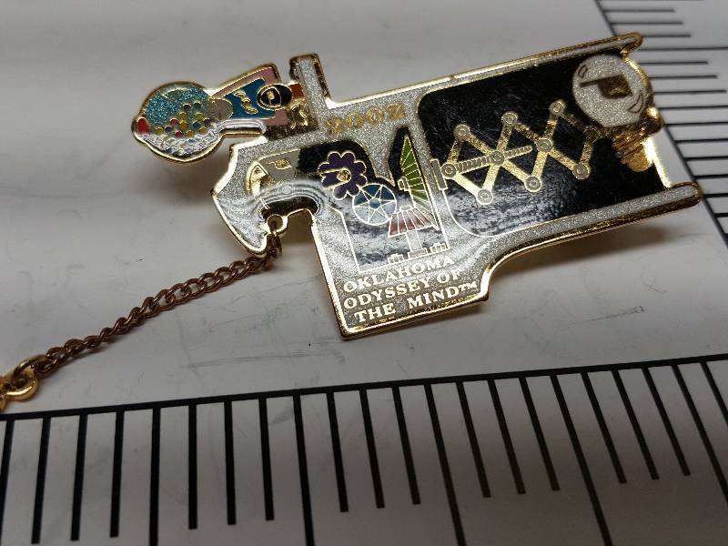 lot 8742 image: Another one of those collectable hat or lapel pins most are finished with wild porcelain colors.