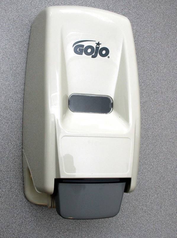 lot 8755-2 image: New GOJO Bag-in-Box 800-mL Dispenser only Part # 9034 race shop trailer garage.