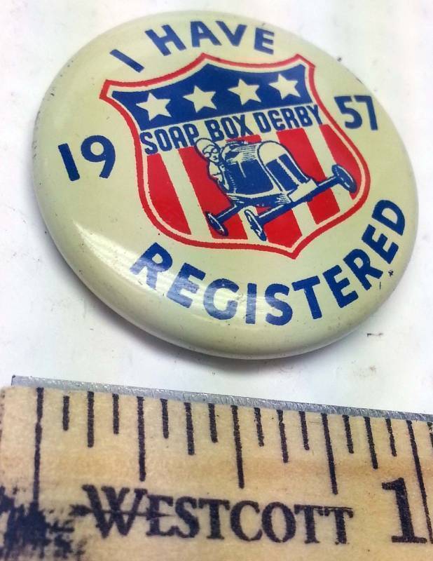 lot 8862 image: Original and Cool looking I have registered for the 1957 Soap Box Derby hat or lapel pin. Out of a collectors jewelry box.