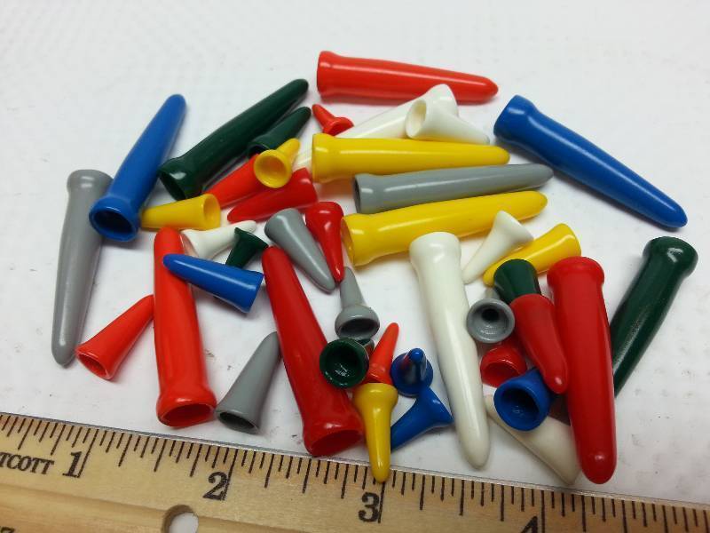 lot 9146 image: For your work bench or tool box is the assorted sizes package of vacumn port plugs and caps.