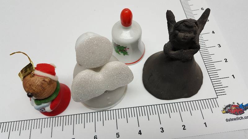 lot 6012 image: This lot will make it easy to add 4 different collectable bells to your collection or decoration