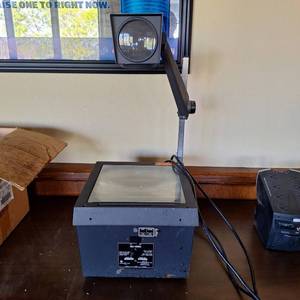 lot 37338 image: Bell Howell Projector