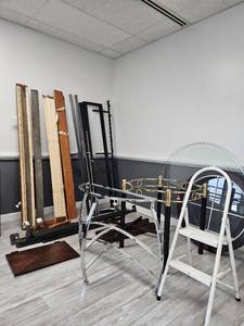 lot 37428 image: Assorted Lot With Black And Gold Table, Wooden Table With Glass Top, Bed Frames And more