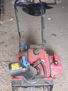 lot 28110 image: Toro Snow Blower and Gas Can