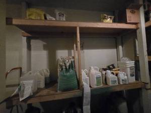 lot 33080 image: Contents Of Shelf (Assorted Lawn Care and Fertilizer Solutions)
