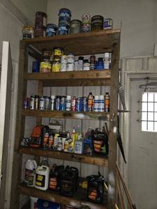 lot 33086 image: Contents Of Shelf - Hydraulic Fluids  Paint  Stain  Motor Oil