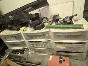 lot 33093 image: (3) Plastic Totes Of Lawn Mower Parts