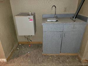 lot 81648 image: Water Fountain And Cabinet WSink
