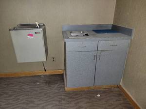 lot 81649 image: Water Fountain And Cabinet
