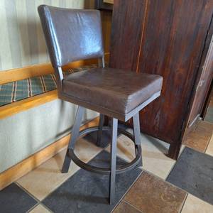 lot 27128 image: Brown Swivel Faux Leather Chair