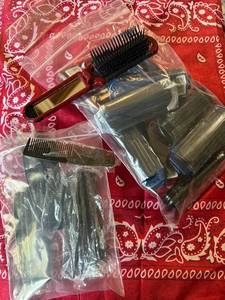 lot 1465 image: Bulk Travel hairbrush, and mini combs combo. a dozen travel, hairbrushes and a bundle of combs
