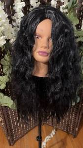 lot 1473 image: Long black, kinky synthetic wig