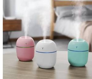 lot 62945 image: Mini Portable USB Ultrasonic Air humidifier Aroma Essential Oil Diffuser (Pink)