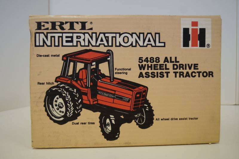 lot 1656 image: ERTL International 5488 All Wheel Drive Assist Tractor, 116 scale, #409, Dusty but NIB