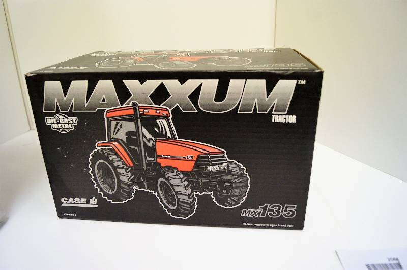lot 2058 image: ERTL CaseIH MX135 Tractor, 116 scale, MFWD Front Axle, Opening Hood, Collector Insert NIB
