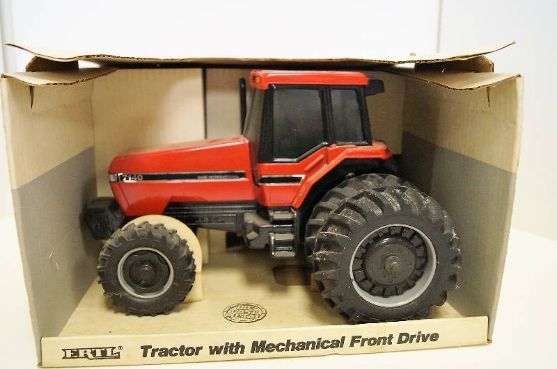 lot 2063 image: ERTL Case IH Tractor wMechanical Front Drive, 116, NO. 619, New in Box but dusty