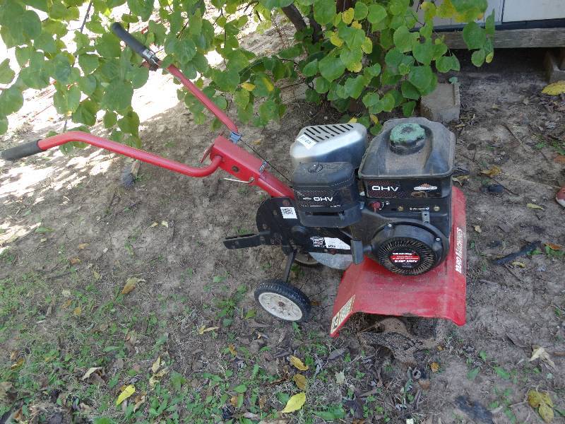 lot 232 image: Yard machine 5 hp Rototiller.