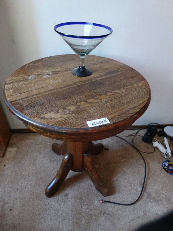 lot 316 image: Round oak lamp table