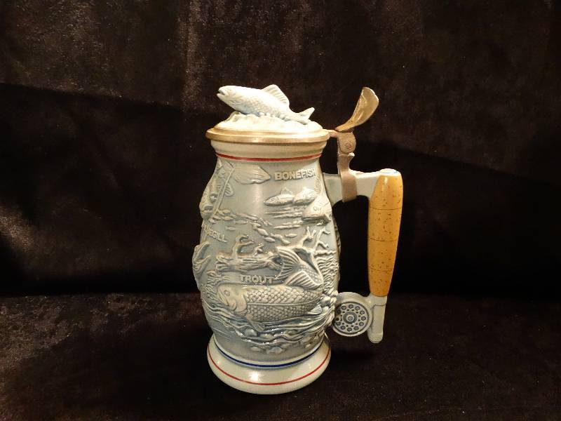 lot 481 image: Avon 1990 Fishing Beer Stein