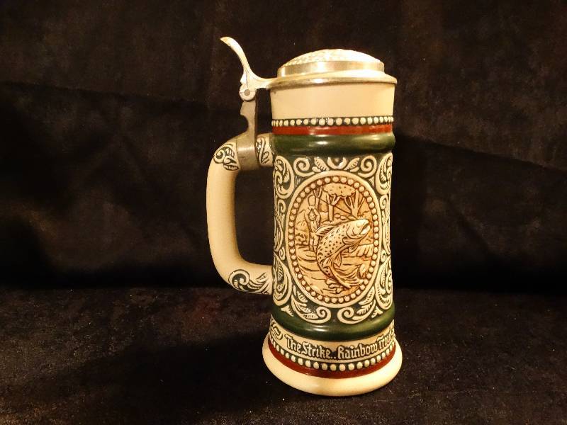 lot 489 image: Avon Huntingfishing theme Beer Stein