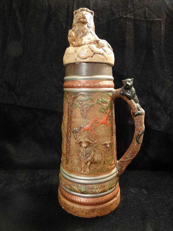 lot 495 image: Large African theme beer stein