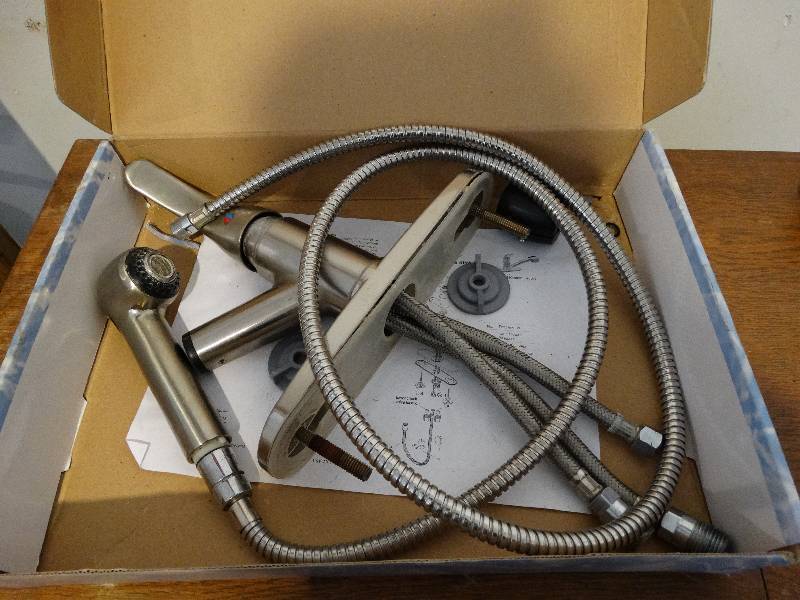 lot 727 image: Gently useed Pheonis Kitchen faucet.
