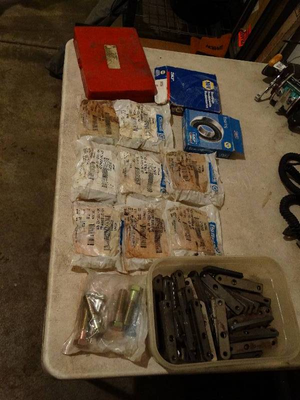 lot 825 image: Lot of Napa, Fastenal, case of O-rings, & small tote of metal