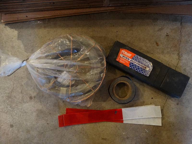 lot 840 image: Lincoln Electric Self Shielded cored wire - 25lb. 1.7mm, Stick electrodes, Reflective tape