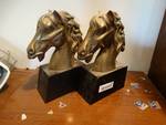 2 large brass horse heads