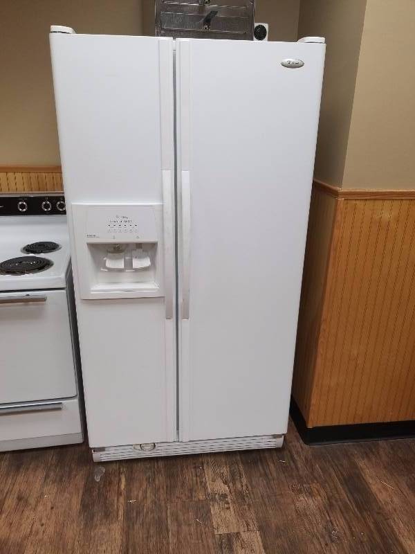 lot 5616 image: Whirlpool white side-by-side refrigerator