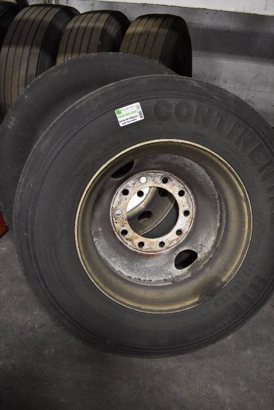 lot 1407 image: Large Lot Of Retread Semi Tires And Wheels