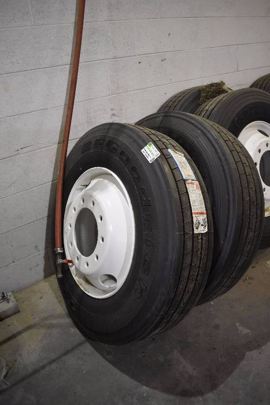 lot 1416A image: Pair Of New Semi Tires And Wheels
