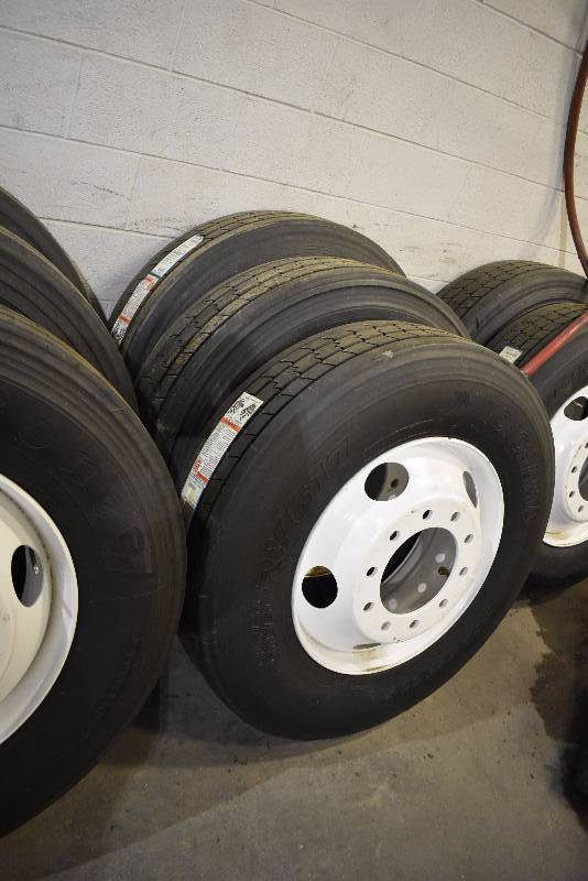 lot 1416C image: Pair Of New Semi Tires And Wheels