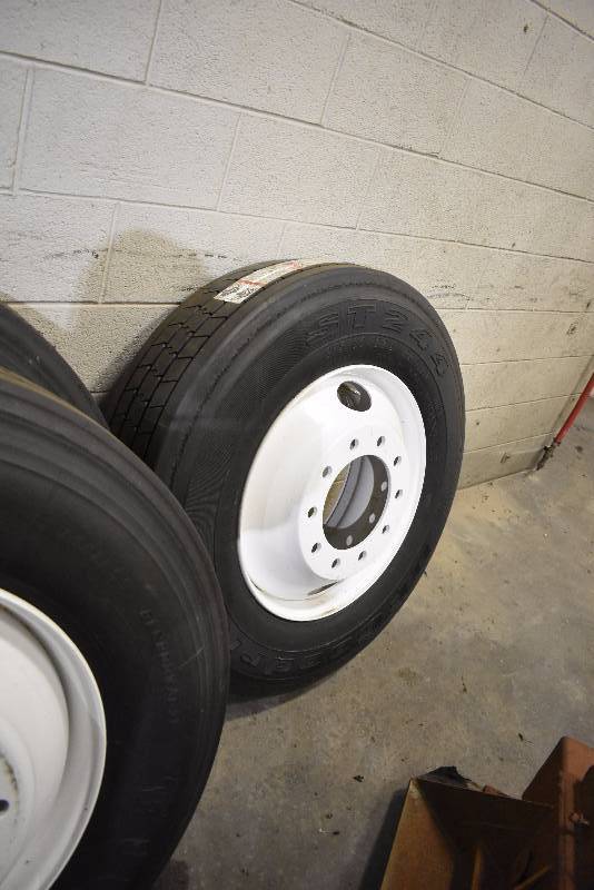 lot 1416E image: Pair Of New Semi Tires And Wheels