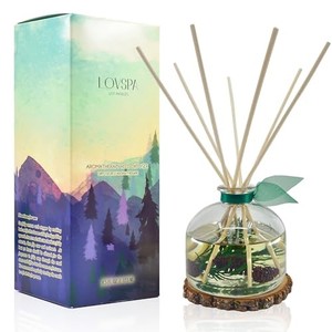 lot 31109 image: LOVSPA Winter Forest Pine Reed Diffuser Gift Set  Juniper Berries, Sandalwood & Cedar Notes  Made with Real Botanicals  Wooden Coaster  Proudly Made in The USA