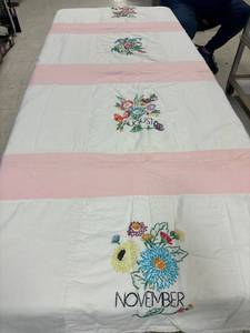 lot 1 image: Twin size Quilt, embroidered, floral with months of year.