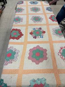 lot 2 image: Twin size machine made quilt, faded orange